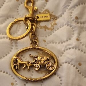 Coach Gold Carriage Keychain